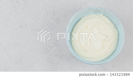 Plain Greek Yogurt In Ceramic Bowl Top View Plain Greek Yogurt In Ceramic Bowl Top View 141521994