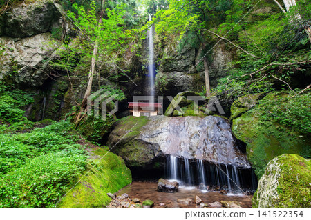 A small waterfall and a place of prayer A small waterfall and a place of prayer 141522354