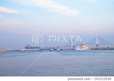 Yokohama Bay Bridge and the cruise ship Asuka Yokohama Bay Bridge and the cruise ship Asuka 141522936
