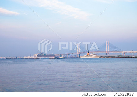 Yokohama Bay Bridge and the cruise ship Asuka Yokohama Bay Bridge and the cruise ship Asuka 141522938