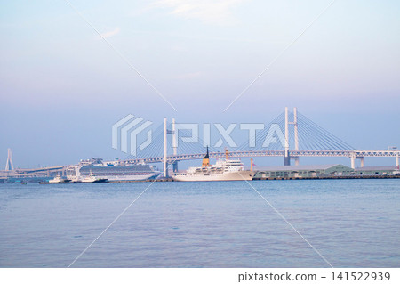 Yokohama Bay Bridge and the cruise ship Asuka Yokohama Bay Bridge and the cruise ship Asuka 141522939