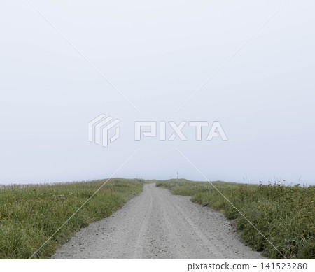 A road running along the Hashikotan sandbar that separates Lake Furen and Nemuro Bay in Betsukai Town, Hokkaido, during the summer. A road running along the Hashikotan sandbar that separates Lake Furen and Nemuro Bay in Betsukai Town, Hokkaido, during the summer. 141523280