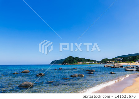 A clear blue sky, a beautiful, crystal-clear sea, and a coastal landscape. A clear blue sky, a beautiful, crystal-clear sea, and a coastal landscape. 141523676