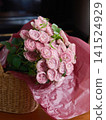 A bouquet of para flowers in a basket A bouquet of para flowers in a basket 141524929