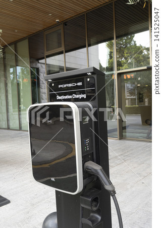 Charging station with a charging cable attached 141525047