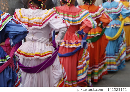 Mexican folk parade in the street Mexican folk parade in the street 141525151
