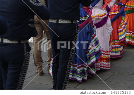 Mexican folk parade in the street 141525153