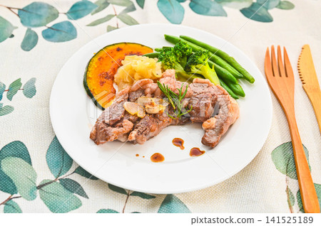 Cross lamb steak with sautéed vegetables Cross lamb steak with sautéed vegetables 141525189