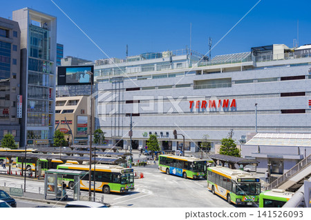 A view of the JR Kinshicho Station South Exit plaza on a clear, sunny day with a blue sky. A view of the JR Kinshicho Station South Exit plaza on a clear, sunny day with a blue sky. 141526093