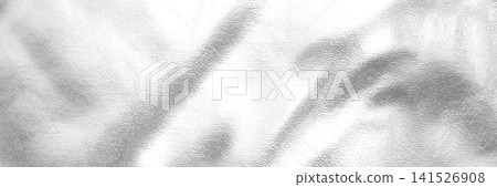 Soft white textured fabric with gentle folds and subtle metallic sheen background Soft white textured fabric with gentle folds and subtle metallic sheen background 141526908