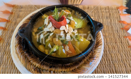 Moroccan Vegetable Tagine with Almonds and Raisins Moroccan Vegetable Tagine with Almonds and Raisins 141527344
