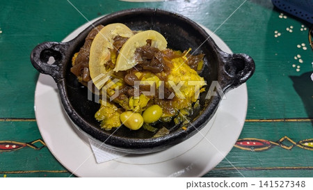 Moroccan Chicken Tagine with Lemon and Olives Moroccan Chicken Tagine with Lemon and Olives 141527348