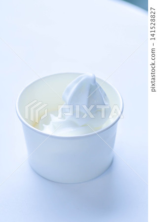 ice cream or milk ice cream or scoop of ice cream or ice cream in paper cup ice cream or milk ice cream or scoop of ice cream or ice cream in paper cup 141528827