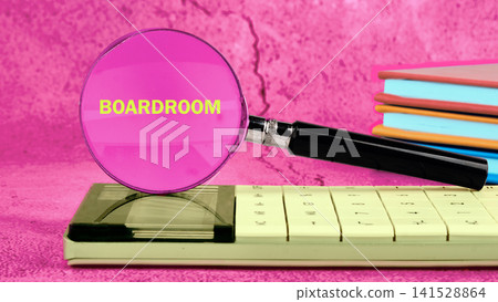 Magnifying glass over boardroom text and calculator, next to colorful notebooks on a bright pink background, symbolizing financial meetings and analysis 141528864