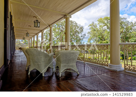 Tropical Veranda of beautiful colonial Chateau de Labourdonnais, Mauritius Tropical Veranda of beautiful colonial Chateau de Labourdonnais, Mauritius 141529983