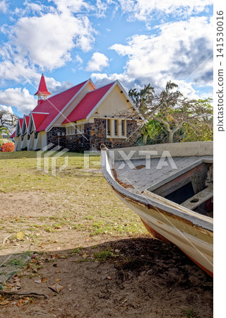 Notre-Dame Auxiliatrice Church with Wooden Fishing Boat, Mauritius Notre-Dame Auxiliatrice Church with Wooden Fishing Boat, Mauritius 141530016