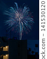 The Sumida River Fireworks Festival, visible beyond the buildings of downtown Tokyo – a quintessential Japanese scene. 141530120