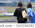 Passengers looking at airplanes, view from the observation deck at Haneda Airport 141530282