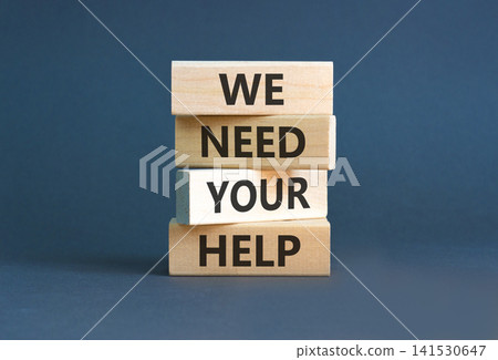 We need your help words symbol. Concept words We need your help on beautiful wooden blocks. Beautiful grey background. Business support we need your help concept. Copy space. 141530647