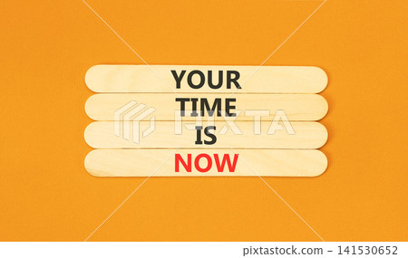 Your time is now words symbol. Concept words Your time is now on beautiful wooden sticks. Beautiful orange background. Business support motivational your time is now concept. Copy space. Your time is now words symbol. Concept words Your time is now on beautiful wooden sticks. Beautiful orange background. Business support motivational your time is now concept. Copy space. 141530652