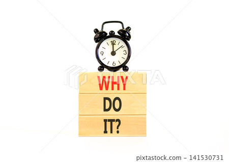 Why do it words symbol. Concept words Why do it on beautiful wooden blocks. Beautiful white background. Black alarm clock. Business support motivational and Why do it concept. Copy space. 141530731