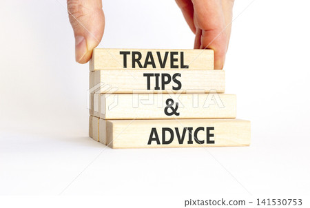 Travel tips and advice words symbol. Concept words Travel tips and advice on beautiful wooden blocks. Beautiful white background. Business lifestyle travel tips and advice concept. Copy space. Travel tips and advice words symbol. Concept words Travel tips and advice on beautiful wooden blocks. Beautiful white background. Business lifestyle travel tips and advice concept. Copy space. 141530753