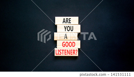 Are you a good listener symbol. Concept words Are you a good listener on beautiful wooden blocks. Beautiful black background. Business and are you a good listener concept. Copy space. Are you a good listener symbol. Concept words Are you a good listener on beautiful wooden blocks. Beautiful black background. Business and are you a good listener concept. Copy space. 141531111