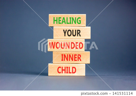 Healing your wounded inner child symbol. Concept words Healing your wounded inner child on beautiful wooden blocks. Beautiful grey background. Psychological Healing inner child concept. Copy space. Healing your wounded inner child symbol. Concept words Healing your wounded inner child on beautiful wooden blocks. Beautiful grey background. Psychological Healing inner child concept. Copy space. 141531114