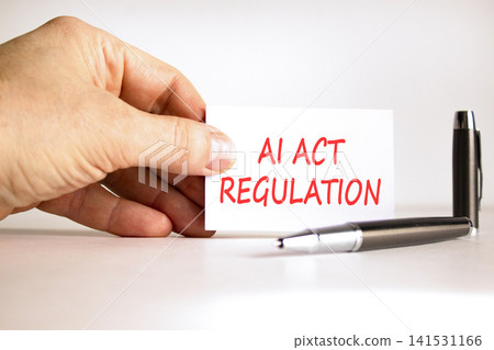 AI act regulation words symbol. Concept words AI artificial intelligence act regulation on beautiful white card. Beautiful white background. Black pen. Business AI act regulation concept. Copy space. AI act regulation words symbol. Concept words AI artificial intelligence act regulation on beautiful white card. Beautiful white background. Black pen. Business AI act regulation concept. Copy space. 141531166