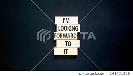 I'm looking forward to it symbol. Concept words I'm looking forward to it on beautiful wooden blocks. Beautiful black background. Business and I'm looking forward to it concept. Copy space. I'm looking forward to it symbol. Concept words I'm looking forward to it on beautiful wooden blocks. Beautiful black background. Business and I'm looking forward to it concept. Copy space. 141531266