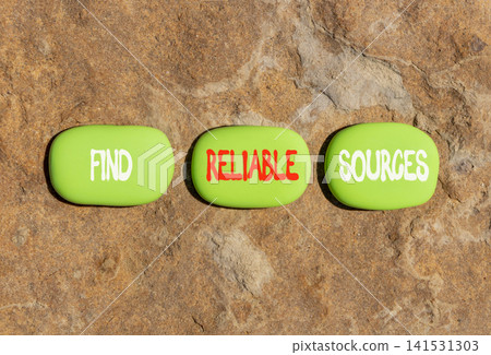 Find reliable sources words symbol. Concept words Find reliable sources on beautiful green stones. Beautiful stone background. Business find reliable sources concept. Copy space. 141531303