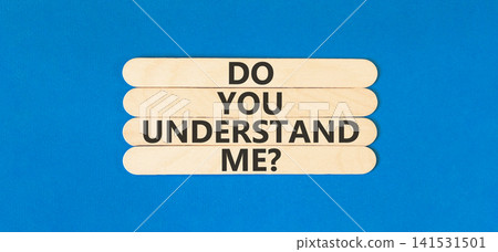 Do you understand me words symbol. Concept words Do you understand me on beautiful wooden sticks. Beautiful blue background. Business Do you understand me concept. Copy space. Do you understand me words symbol. Concept words Do you understand me on beautiful wooden sticks. Beautiful blue background. Business Do you understand me concept. Copy space. 141531501
