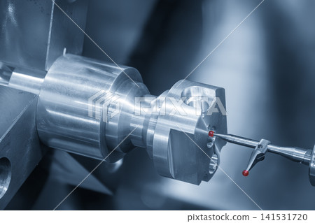 Quality control inspection on a CNC lathe machine using a modular probe in a blue tone scene. Quality control inspection on a CNC lathe machine using a modular probe in a blue tone scene. 141531720
