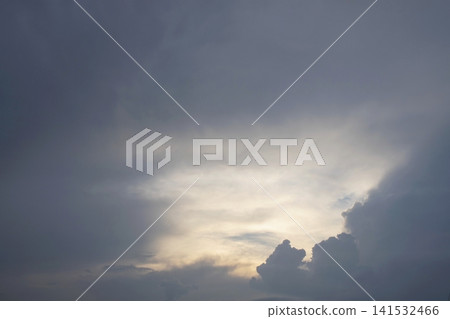 Soft pink and purple clouds at sunset. Fluffy cumulus clouds in the sky. 141532466