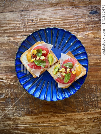 Open sandwich on a blue plate Open sandwich on a blue plate 141532475