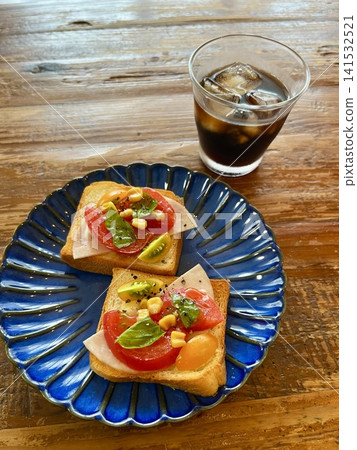 Open sandwich on a blue plate Open sandwich on a blue plate 141532521
