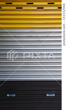Three-color metal roller shutter door texture background. Abstract geometric background of colorful metal rolling shutter door with yellow, silver, and black horizontal stripes pattern. Three-color metal roller shutter door texture background. Abstract geometric background of colorful metal rolling shutter door with yellow, silver, and black horizontal stripes pattern. 141532948