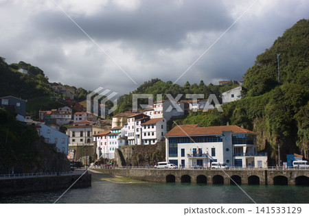 Colorful houses and port at Cudillero coastal village, in Asturias. Colorful houses and port at Cudillero coastal village, in Asturias. 141533129