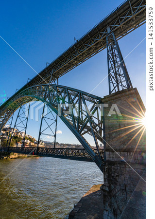 Dom Luis I bridge over Douro river Porto Portugal low angle view Dom Luis I bridge over Douro river Porto Portugal low angle view 141533759
