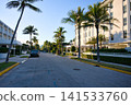 Quiet Palm Beach Street With Parked Cars And Condo Buildings 141533760