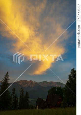 Colorful sunset sky. Amazing nature background. Evening adventure hiking Colorful sunset sky. Amazing nature background. Evening adventure hiking 141534002