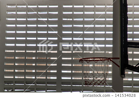 Indoor Basketball Hoop Against Gym Ventilation Wall Indoor Basketball Hoop Against Gym Ventilation Wall 141534028