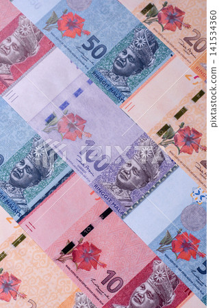 Malaysian ringgit banknotes as a tool for trade and financial transactions. The Malaysian ringgit 141534360