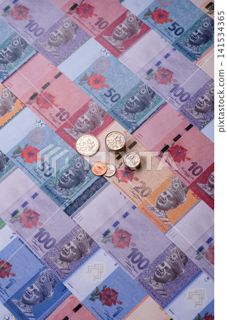 Malaysian ringgit banknotes as a tool for trade and financial transactions. The Malaysian ringgit Malaysian ringgit banknotes as a tool for trade and financial transactions. The Malaysian ringgit 141534365