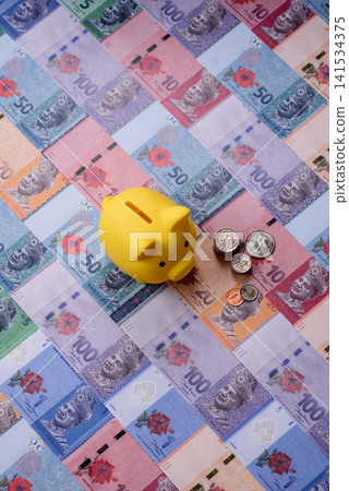 A piggy bank as a concept for storing, accumulating, and saving financial resources. A piggy bank A piggy bank as a concept for storing, accumulating, and saving financial resources. A piggy bank 141534375