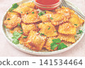 fried ravioli with parmesan cheese, served with red sauce and garnished with herbs, on a light background, no people, 141534464