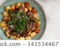 kuyrdak, roast offal with potatoes and fresh herbs, homemade in Kazakh, no people, 141534467