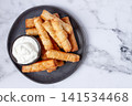 fried spring rolls with cheese, on a plate, with cream sauce, no people, 141534468