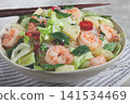 Thai salad with shrimp and rice noodles, pineapple slices, coriander and mint leaves, homemade , no people, 141534469