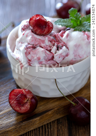 Vanilla-cherry lactose-free ice cream. Vanilla-cherry lactose-free ice cream. 141534874